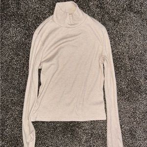 i am selling this tan turtle neck, worn once just don’t like it size S